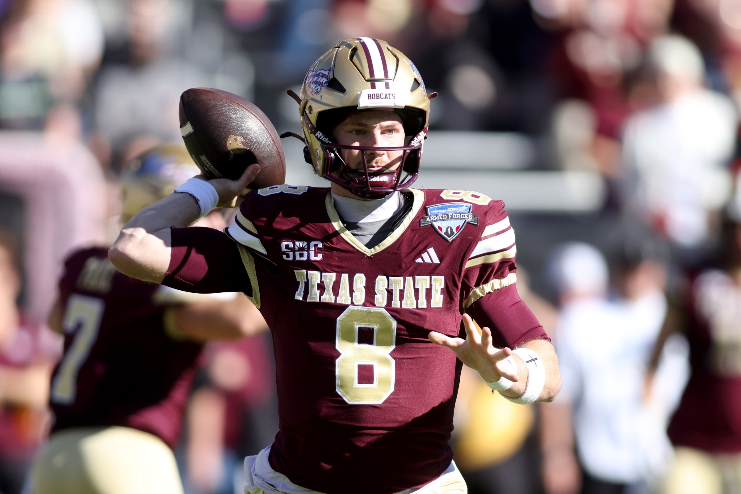 FORT WORTH, TEXAS - JANUARY 02: Brad Jackson #8 of the Texas State Bobcats throws a pass against the Rice Owls during the first half during the 2026 Lockheed Martin Armed Forces Bowl at Amon G. Carter Stadium on January 02, 2026 in Fort Worth, Texas. (Photo by Tim Heitman/Getty Images)