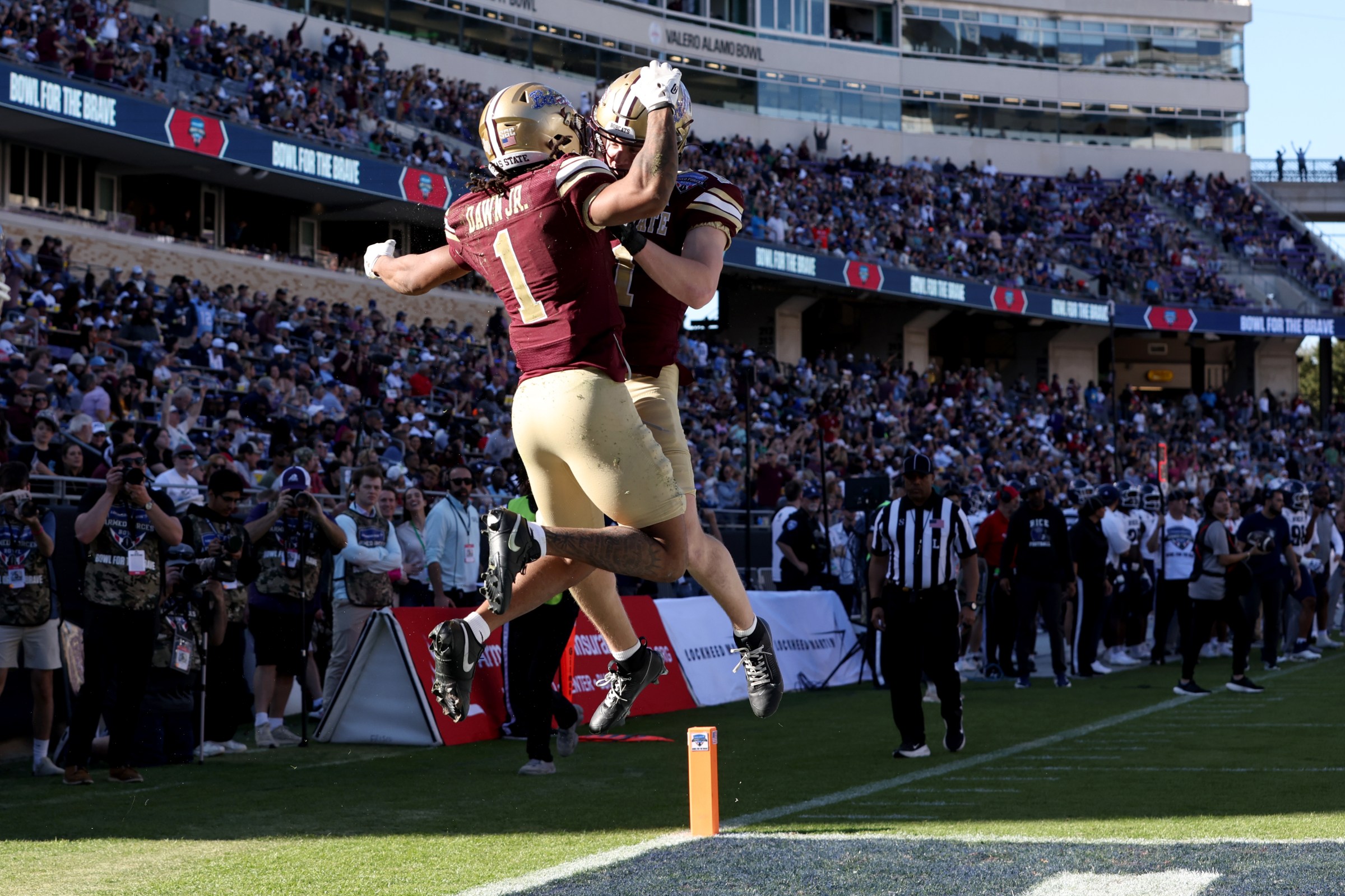FORT WORTH, TEXAS - JANUARY 02: Chris Dawn Jr. #1 and Beau Sparks #11 of the Texas State Bobcats celebrate after a play against the Rice Owls during the second half of the 2026 Lockheed Martin Armed Forces Bowl at Amon G. Carter Stadium on January 02, 2026 in Fort Worth, Texas. (Photo by Tim Heitman/Getty Images)