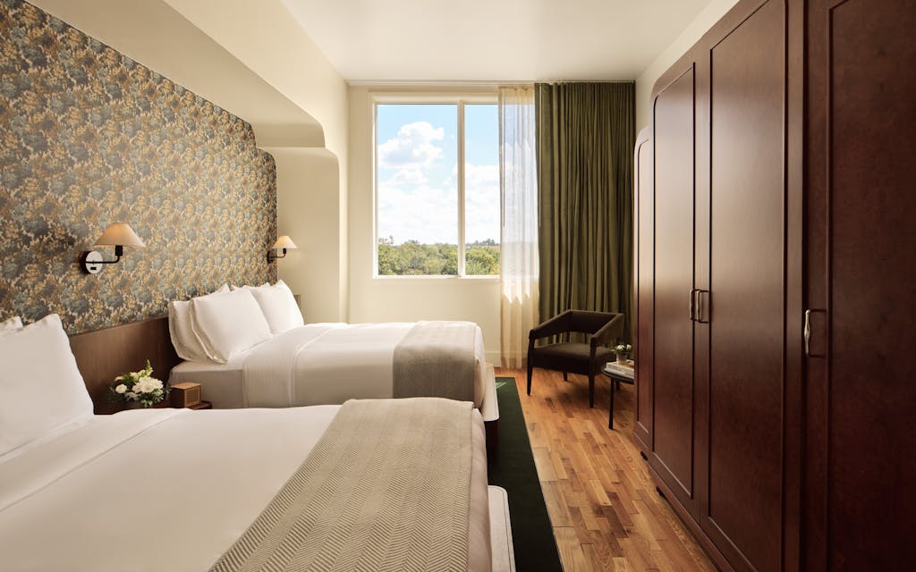 A double queen room at Inn at Green Pastures