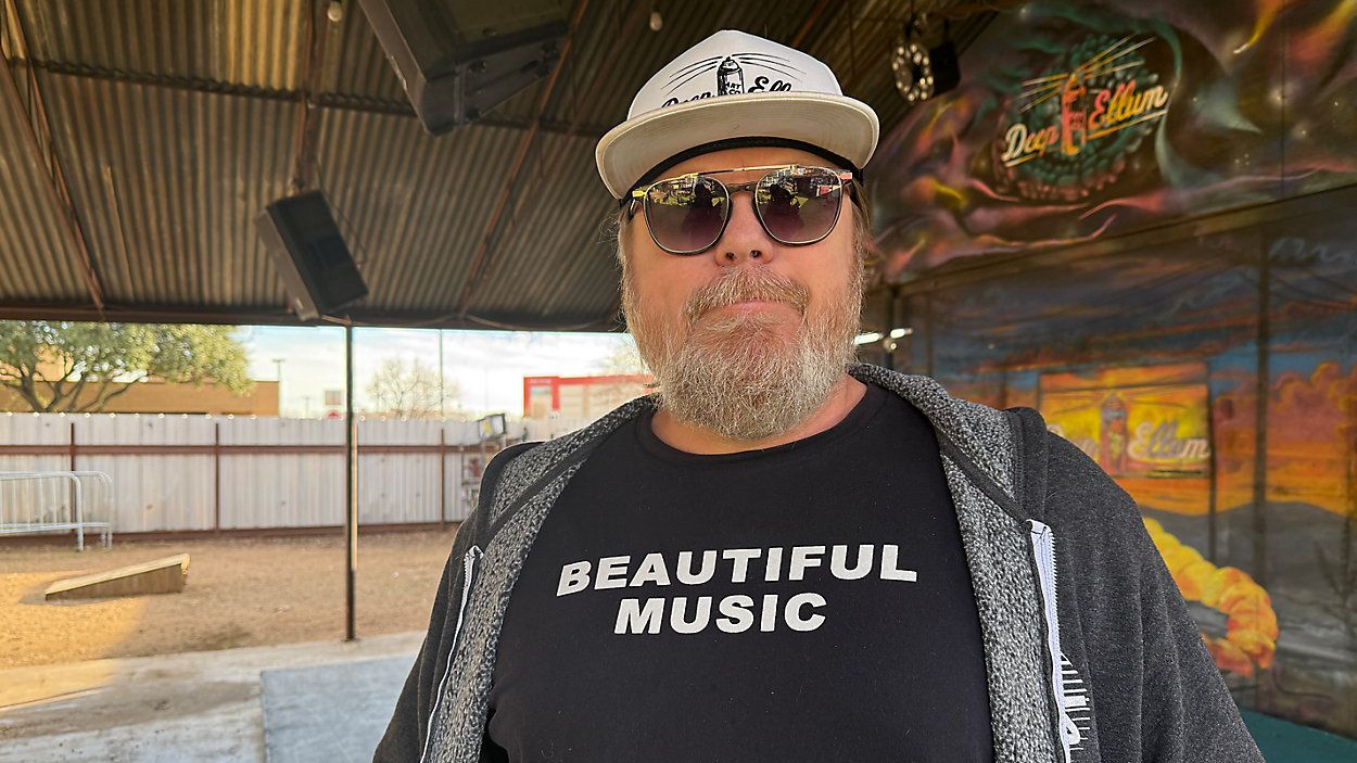 John Larue has been the co-owner of Deep Ellum Art Co. for nearly a decade. (Spectrum News 1/Blessing Iwuchukwu)