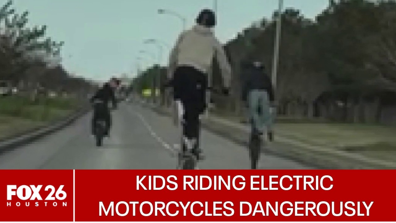 Kids riding electric motorcycles dangerously