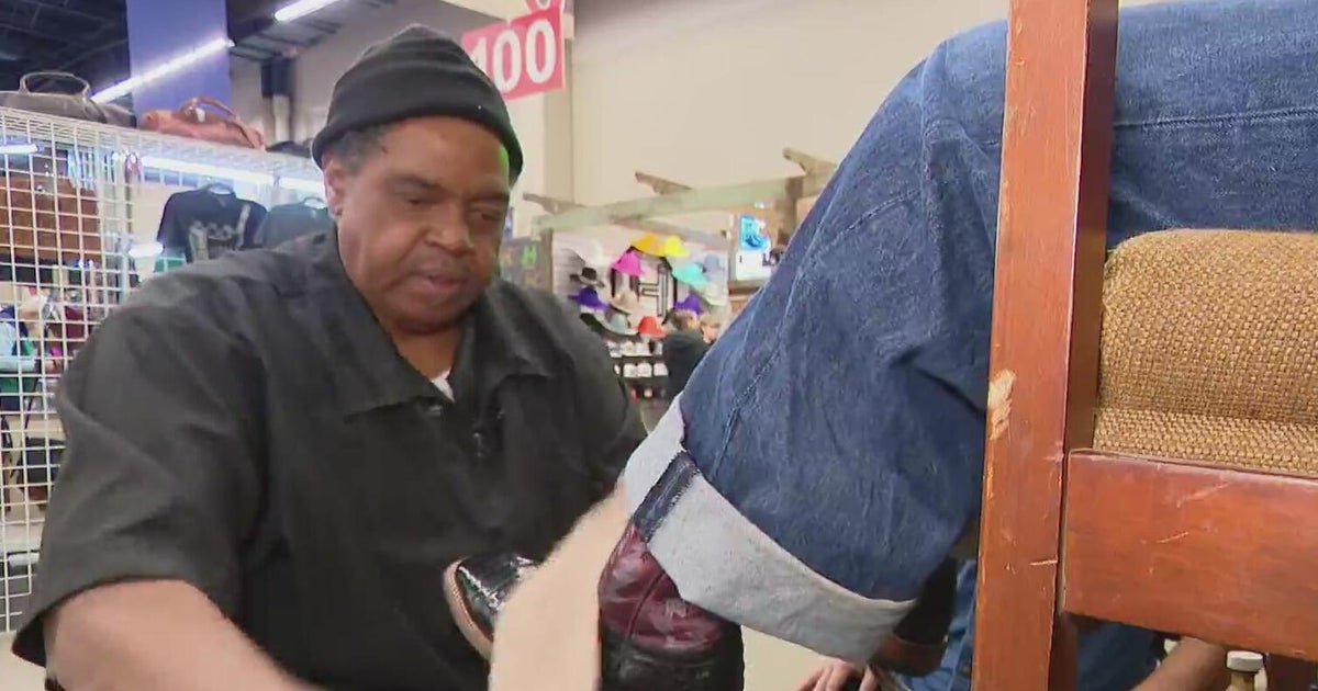 Boot scootin' shine at Fort Worth Stock Show and Rodeo: Big Drew polishes boots and steals the show