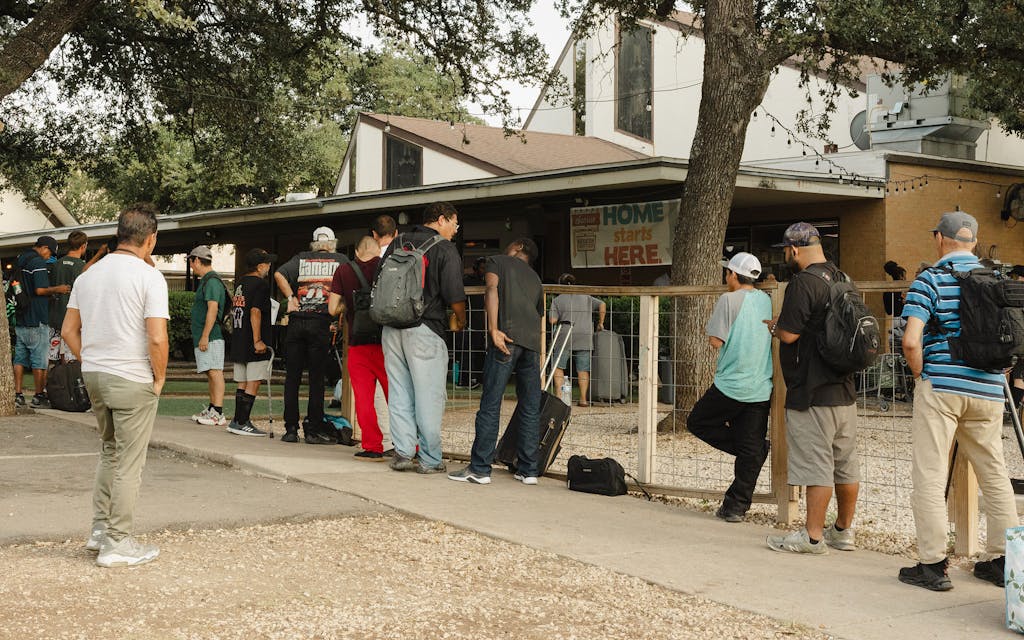 Clients line up to receive services outside Sunrise Community Church.