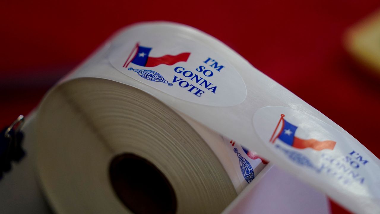 Voting stickers are seen at a political event for Texas Democratic gubernatorial candidate Beto O'Rourke, Wednesday, Aug. 17, 2022, in Fredericksburg, Texas. (AP Photo/Eric Gay)