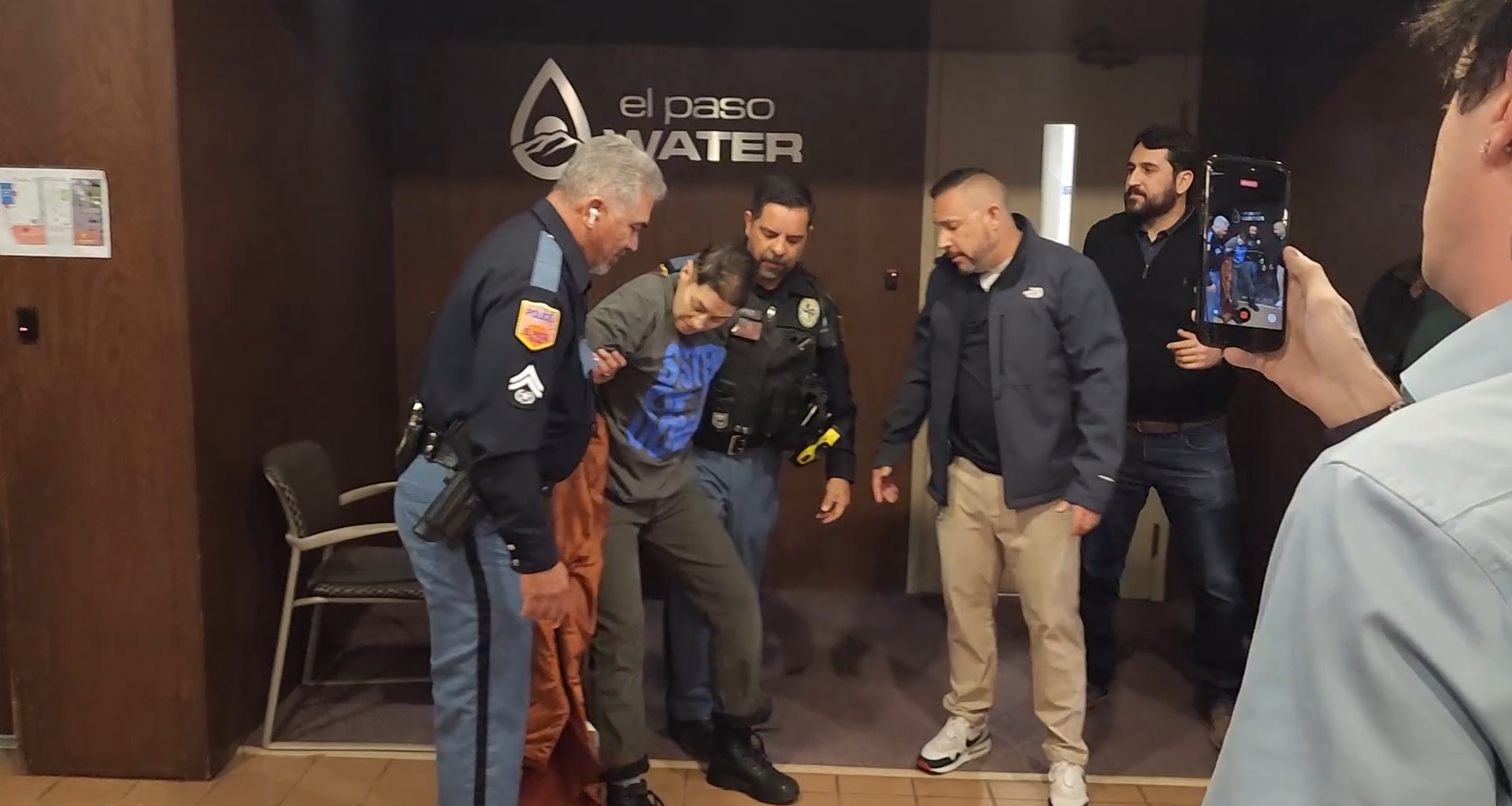 Woman escorted from Public Service Board meeting during water main break discussion