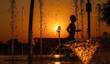 Emmanuel Salazar, 7, runs through the water on the Watauga Splash Pad at Capp Smith Park in Watauga on Thursday, June 27, 2024. Temperatures rose to over 100 degrees as summer begins to heat up in North Texas.