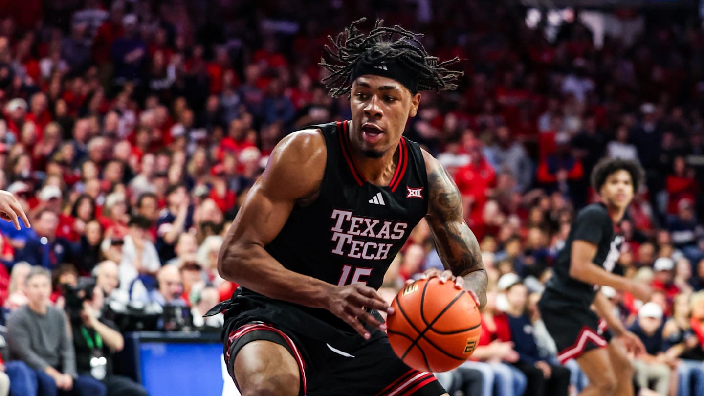 Feb 14, 2026; Tucson, Arizona, USA; Texas Tech Red Raiders forward JT Toppin (15) dribbles and dunks the ball during the first half of the game against the Arizona Wildcats at McKale Memorial Center. Mandatory Credit: Aryanna Frank-Imagn Images