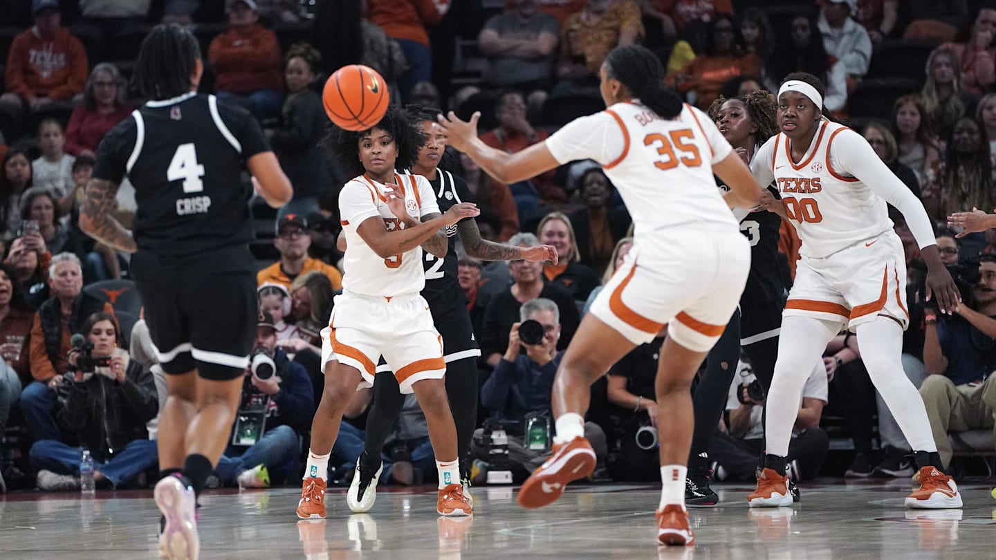 Feb 22, 2026; Austin, Texas, USA; Texas Longhorns guard Rori Harmon (3) passes the ball to forward Madison Booker (35) during the first quarter against the Mississippi Rebels at Moody Center. Mandatory Credit: Dustin Safranek-Imagn Images
