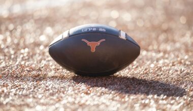Dec 21, 2024; Austin, Texas, USA; Detailed view of a Texas Longhorns logo on an official NCAA football on the field during the CFP National playoff first round at Darrell K Royal-Texas Memorial Stadium. Mandatory Credit: Mark J. Rebilas-Imagn Images