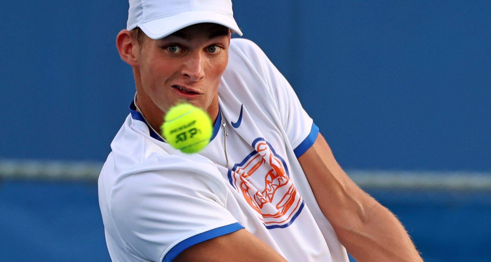 UF's Henry Jefferson hits the ball during the UF vs. FGCU match at the Alfred A. Ring Tennis Complex in Gainesville, Fla., Sunday, Feb. 2, 2025.