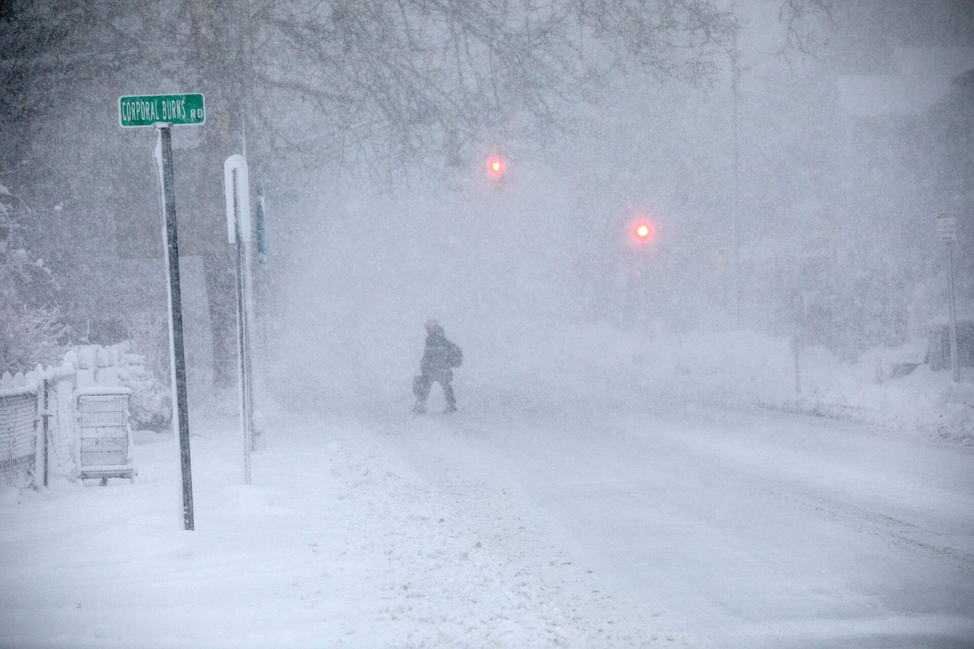 A pedestrian braves the nor’easter in Cambridge. (Robin Lubbock/WBUR)