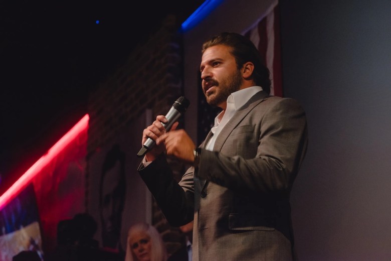 Brandon Herrera, Republican candidate for Texas' 23rd Congressional District, speaks at a campaign event at the Angry Elephant in San Antonio on March 14, 2024.