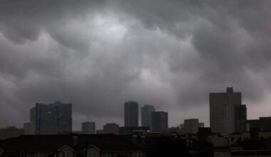Storm clouds drop rain on downtown Fort Worth on Wednesday, April 30, 2025.