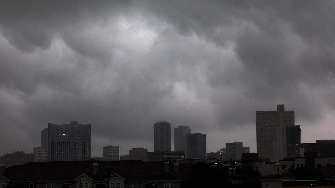 Storm clouds drop rain on downtown Fort Worth on Wednesday, April 30, 2025.
