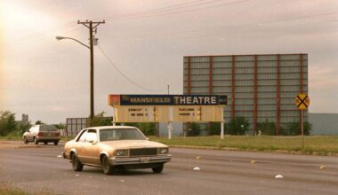 Sept. 30, 1990: Mansfield Drive-in on East Seminary Drive, Fort Worth. There is a sign visible that reads “The Mansfield Theatre” with a list of movies underneath, including The Exorcist III, Die Hard 2, Flatliners, and Another 48 Hrs.