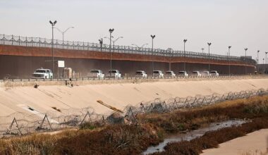 A convoy of U.S. Border Patrol vehicles drives the Mexico-U.S. border near El Paso, Texas.
