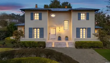 This Terrell Hills looks like French cottage but comes with an amazing backyard oasis