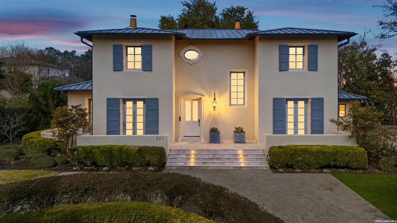 This Terrell Hills looks like French cottage but comes with an amazing backyard oasis