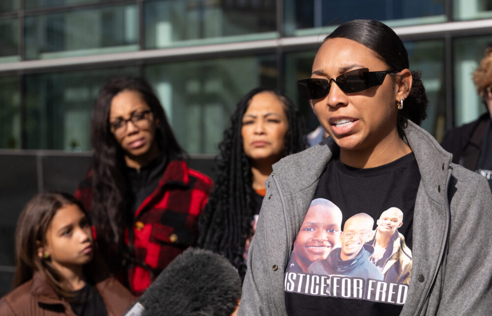 Asa Garcia, Fred Harris' sister, stands with her family outside of the Harris County Criminal Justice Center, where the murder trial of Michael Ownby began on Nov. 27, 2023.