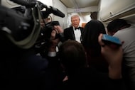 President Donald Trump speaks with reporters aboard Air Force One as he travels from Joint...