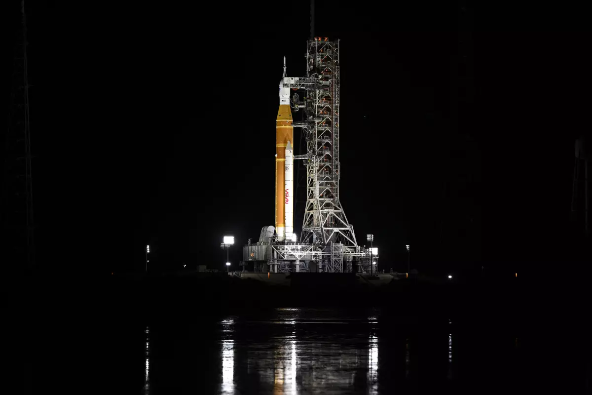 The Space Launch System (SLS) rocket and the Orion spacecraft are seen at the Kennedy Space Center in Cape Canaveral, Fla., on Sunday.