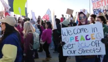 Demonstrators march through Montrose in "ICE out of Houston" protest for immigration reform 
