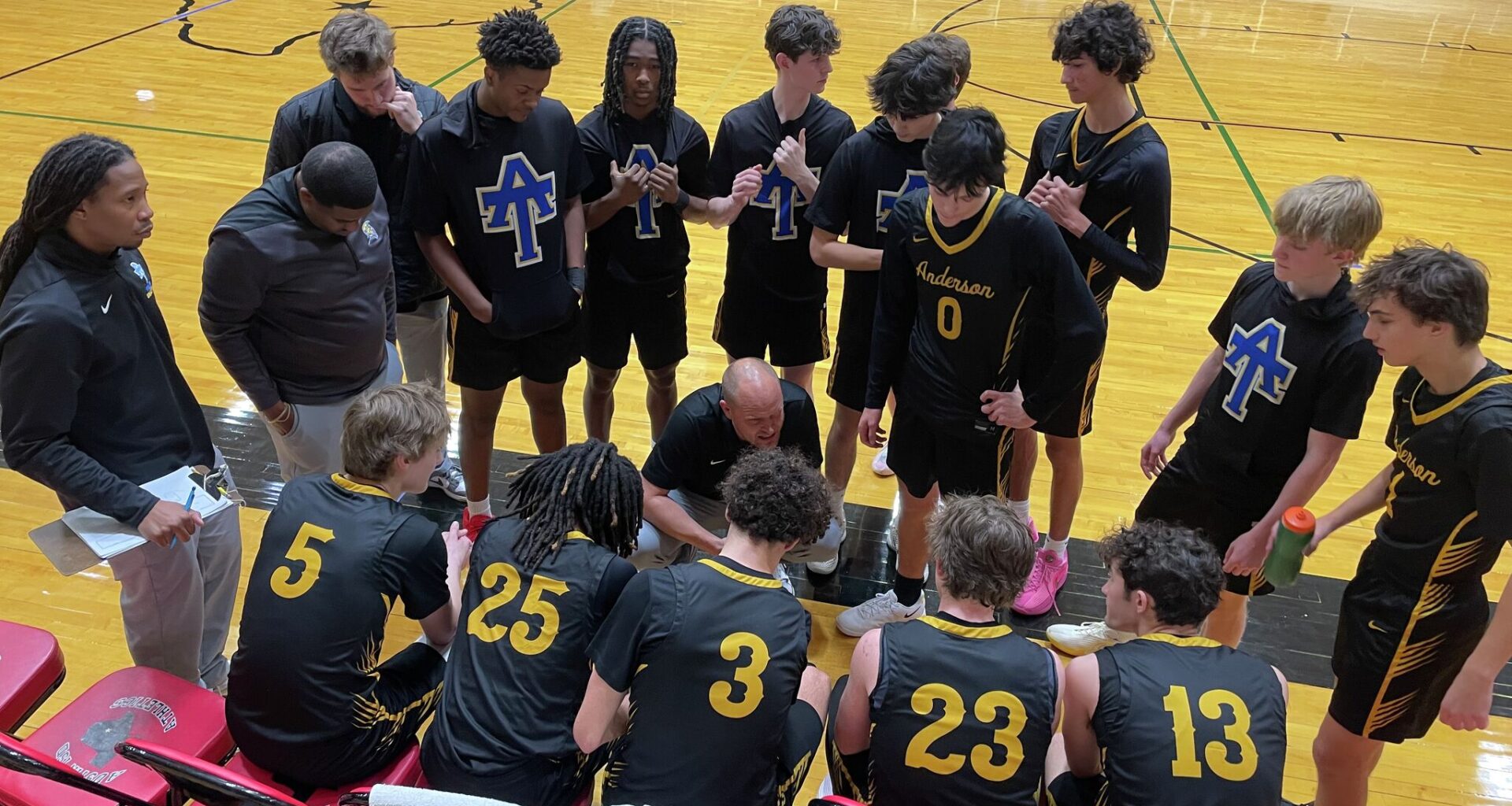 Trojans boys basketball beats Knights