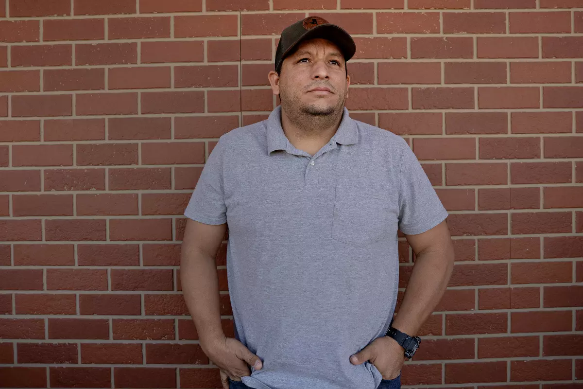 Freddy Pereira poses for a portrait on Jan. 14 at Mi Querencia Latin Market in Katy, Texas. Pereira fled Venezuela two years ago and now works delivering food in Houston. He says he's grateful to President Trump for ordering the seizure of Venezuelan leader Nicolás Maduro: 'I don't believe anyone else, nobody, would have helped us get out of this tragedy.'