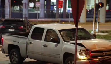 HPD officer hospitalized after driver runs red light, crashes into unmarked police vehicle downtown