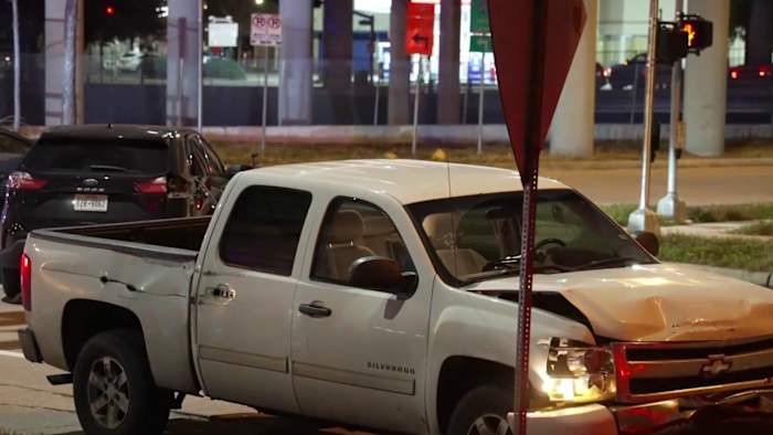 HPD officer hospitalized after driver runs red light, crashes into unmarked police vehicle downtown