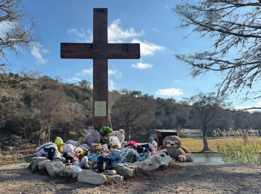 Stuffed animals and flowers surround a memorial outside Camp Mystic, along the Guadalupe River near Kerrville, Texas, honoring the nearly 30 children who were killed when floodwaters tore through the area on July 4.