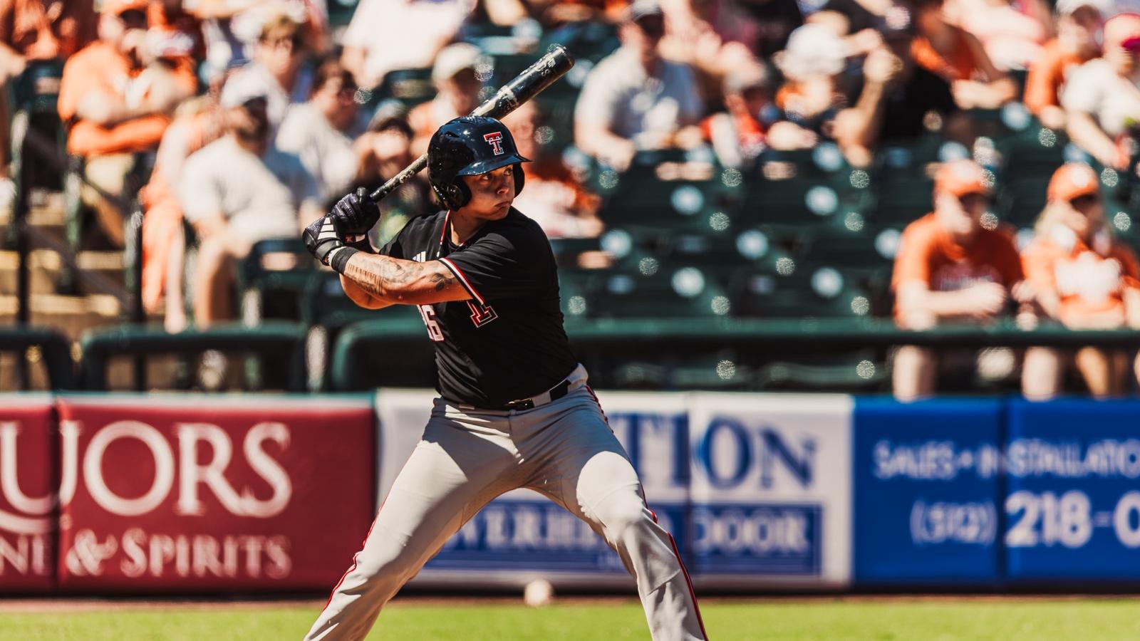 Texas Tech Grad Student Robin Villeneuve takes a swing during an at-bat in the Red Raiders fall contest against Texas in Round Rock.