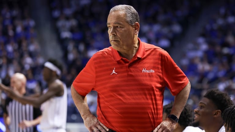 Houston head coach Kelvin Sampson looks on during the first...