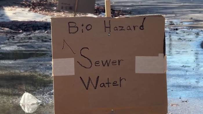 Northeast Side neighbors call for repair of recurring sewage leak