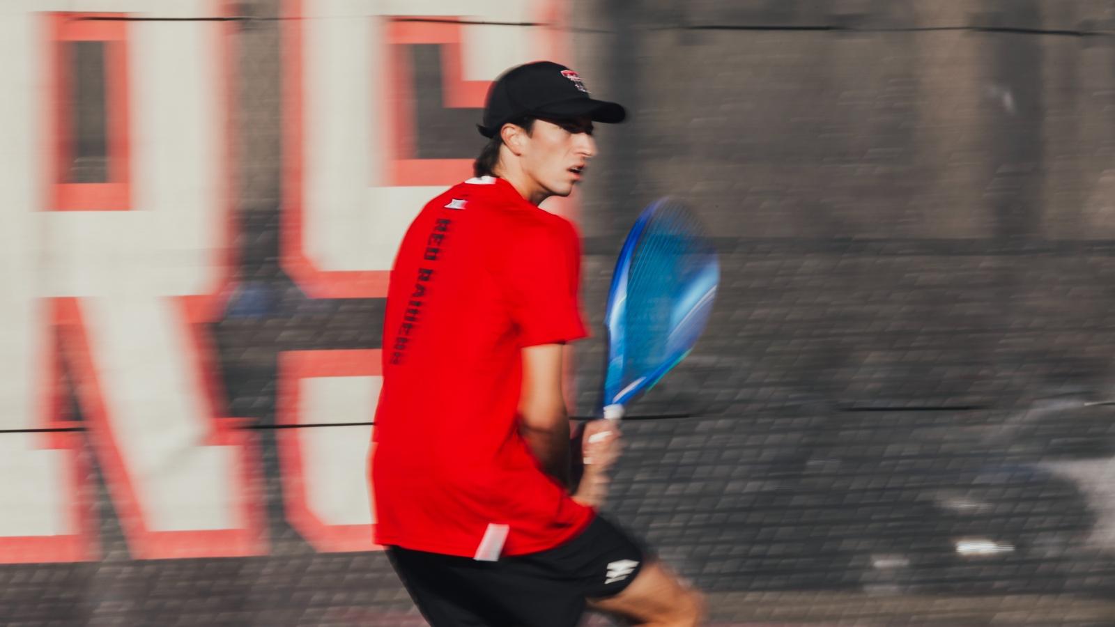The Texas Tech men's tennis team hypes each other up on the court before playing against UTRGV.