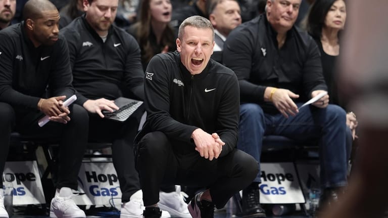West Virginia coach Ross Hodge reacts during the second half...