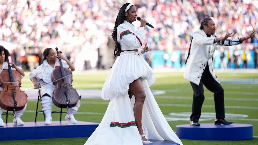 Coco Jones performs before the NFL Super Bowl 60 football game between the New England...