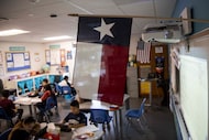 A Texas and American flag in a classroom at the Bowie Fine Arts Academy in Grand Prairie....