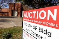 An auction sign is displayed in front of the Skillman Southwestern Branch Library, which the...
