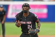 Texas Tech pitcher NiJaree Canady celebrates during the first game of the NCAA softball...