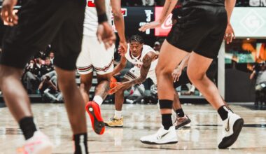 JT Toppin and Christian Anderson gather together in the lane after a basket against Houston.