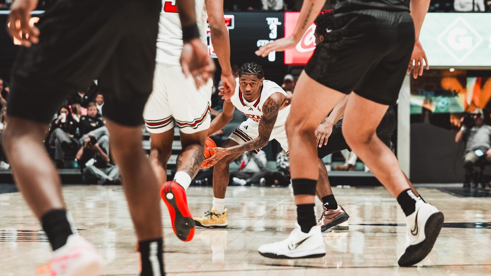 JT Toppin and Christian Anderson gather together in the lane after a basket against Houston.