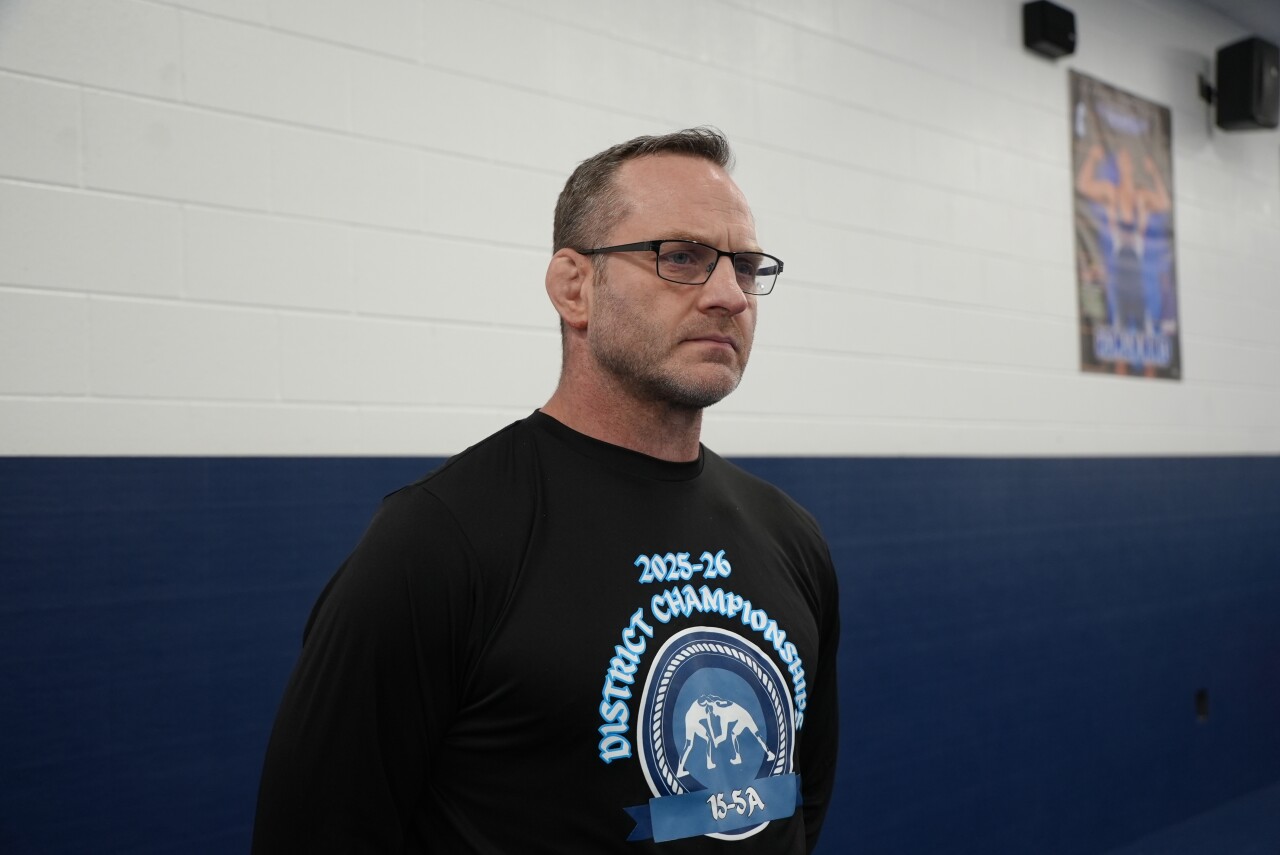 Carroll wrestling head coach Corey Bellino