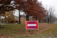 FILE - A "Vote Here" sign is seen on Election Day on Nov. 5, 2024, at Perfect Games in Ames,...