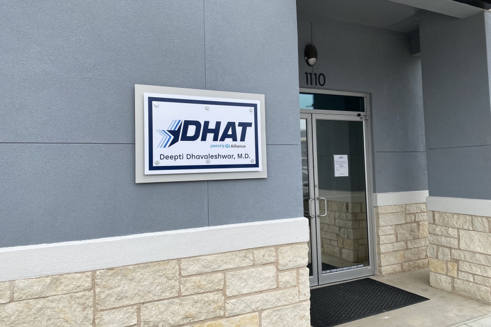 an exterior sign that says DHAT