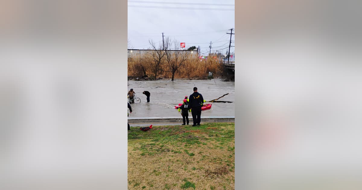 2 men rescued from Cottonwood Creek after being trapped by rising waters