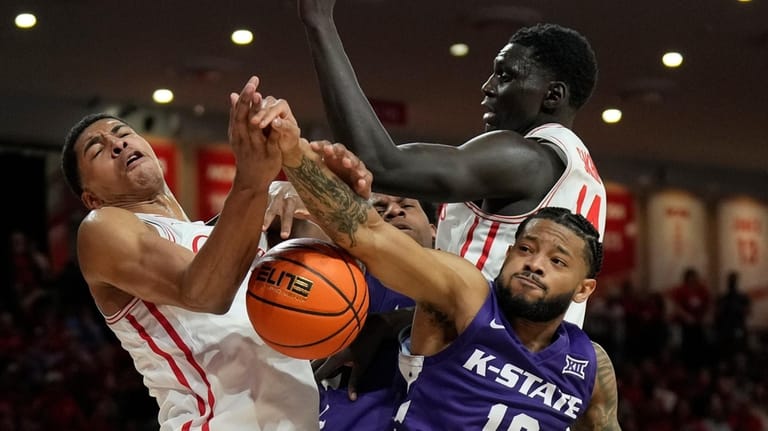 Houston Forward Chris Cenac Jr., top left, and Kalifa Sakho,...