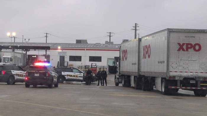 Man shot outside business along I-35; driver injured by stray bullet in separate shooting