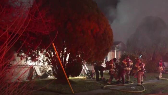 Woman hospitalized, another person missing after northeast Houston apartment fire