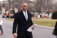 FILE - Housing and Urban Development Secretary Scott Turner, walks towards the West Wing...